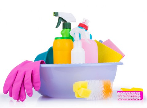 Local cleaner preparing a tidy living room in Westkensington